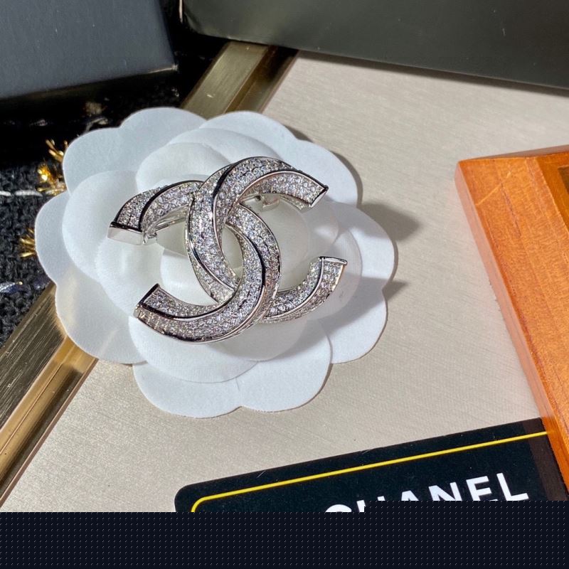 Ch*el brooches